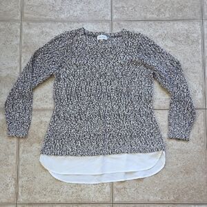 Black and White Knit Sweater with Layered Hem